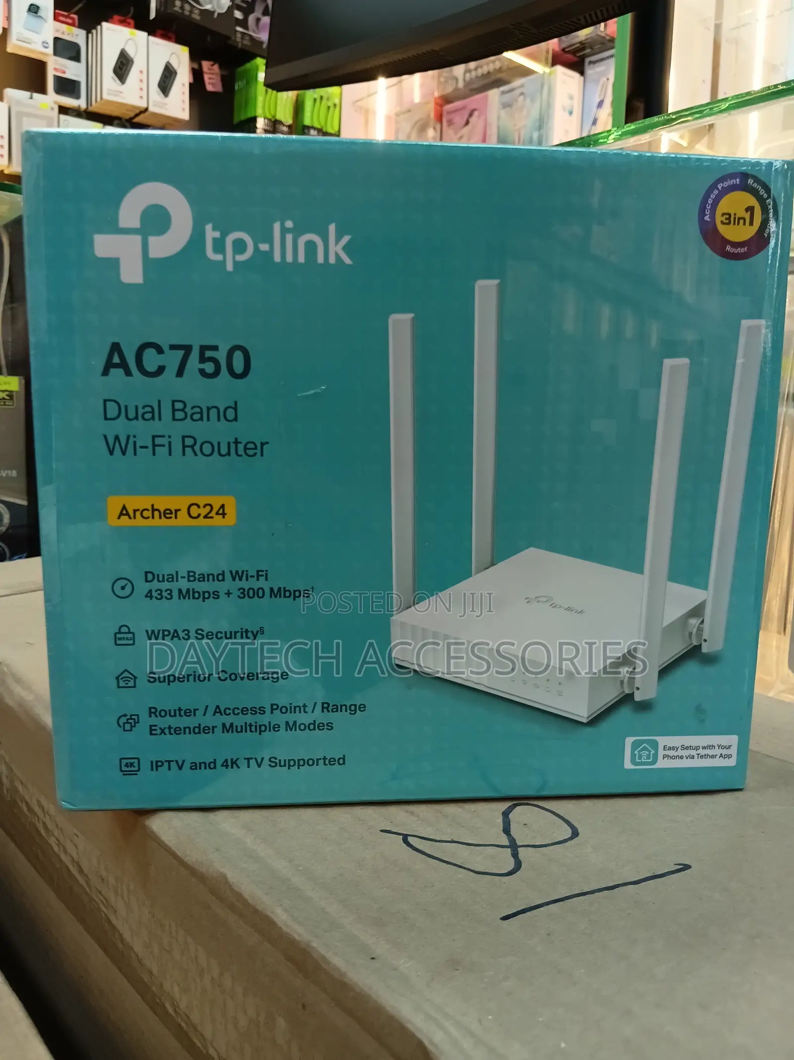 This Is a Tp-Link Archer C24 Ac750 Wireless Dual Band Router in White.