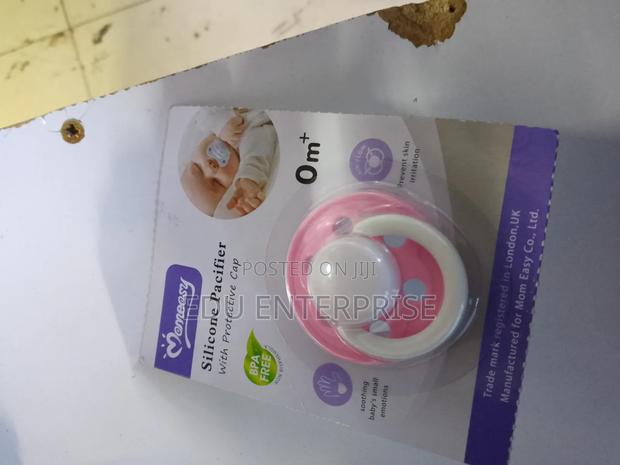 Baby Pacifier With a Cap