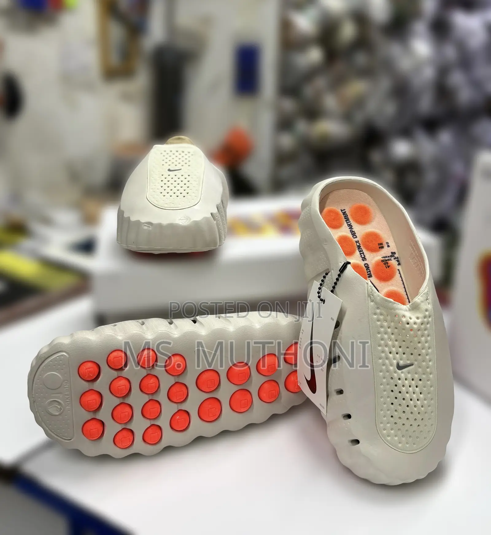 Nike Mind 001 Mules in the "Sail Hyper Crimson" Colorway