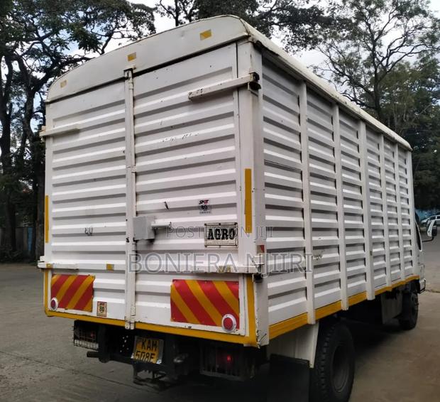 Isuzu NQR Cover Body 2000 White - thumbnail 4