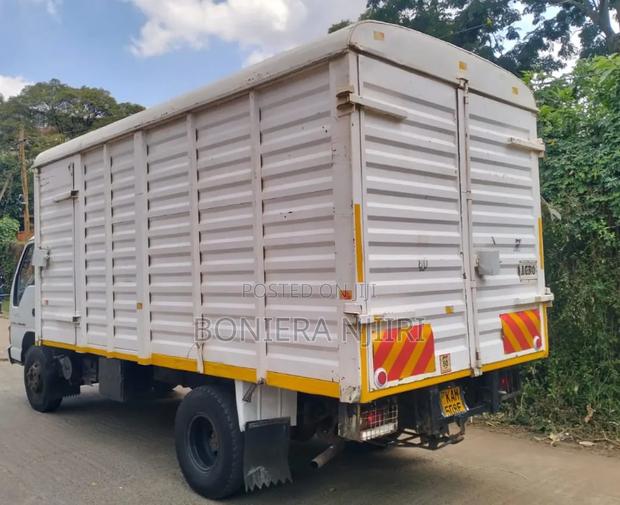 Isuzu NQR Cover Body 2000 White - thumbnail 6