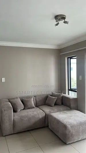 4 Seater Modern Grey Corduroy With Ottoman.