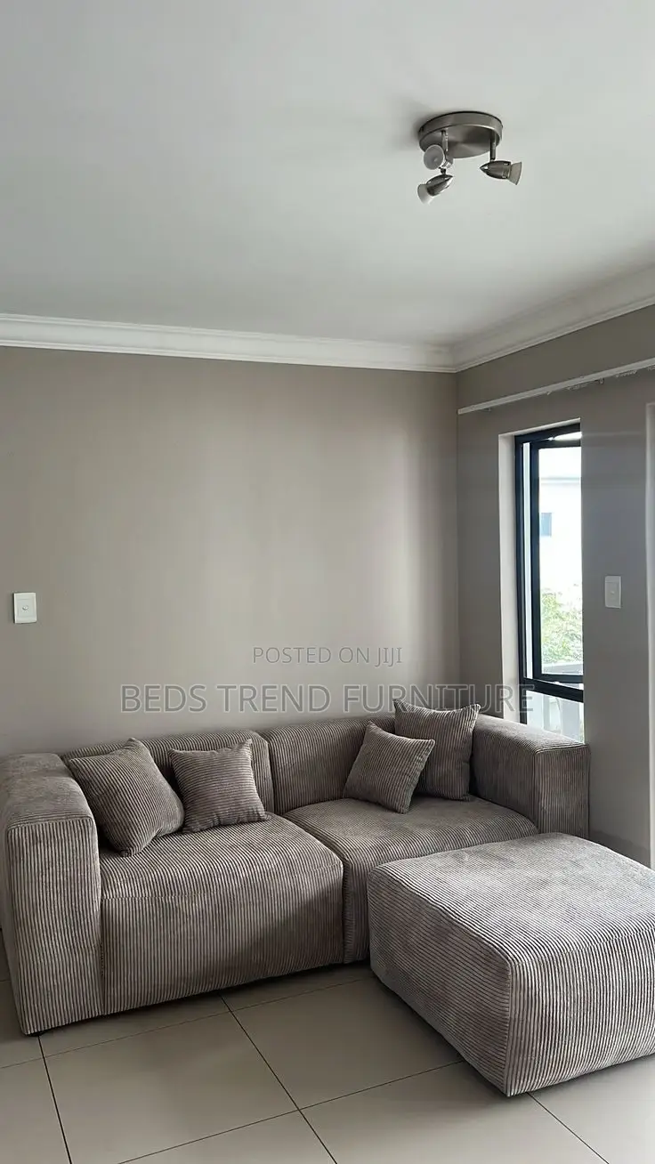 4 Seater Modern Grey Corduroy With Ottoman.