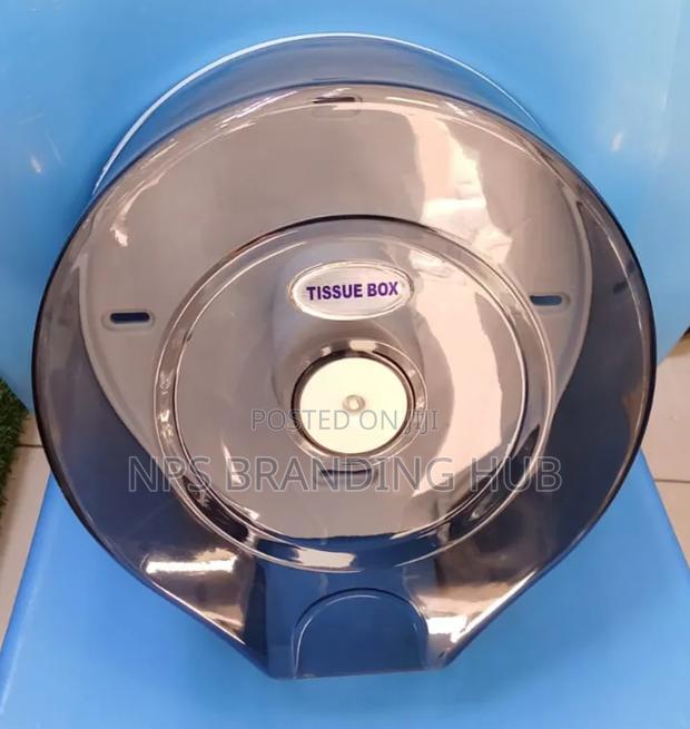 Jumbo Toilet Tissue Dispenser With a Transparent Cover.