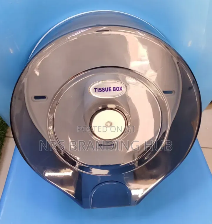 Jumbo Toilet Tissue Dispenser With a Transparent Cover.