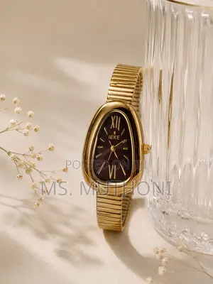 Ieke Brand Gold-Colored Female Wristwatch With a Mesh Strap