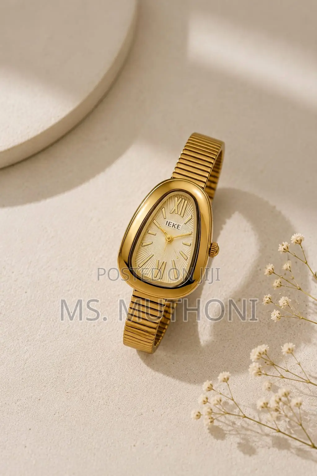 Ieke Brand Gold-Colored Female Wristwatch With a Mesh Strap