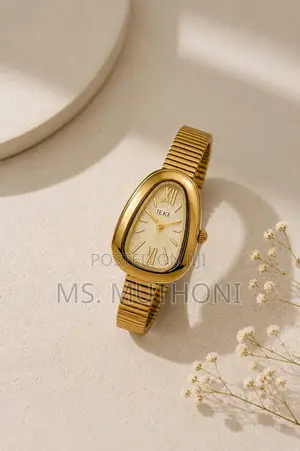 Ieke Brand Gold-Colored Female Wristwatch With a Mesh Strap