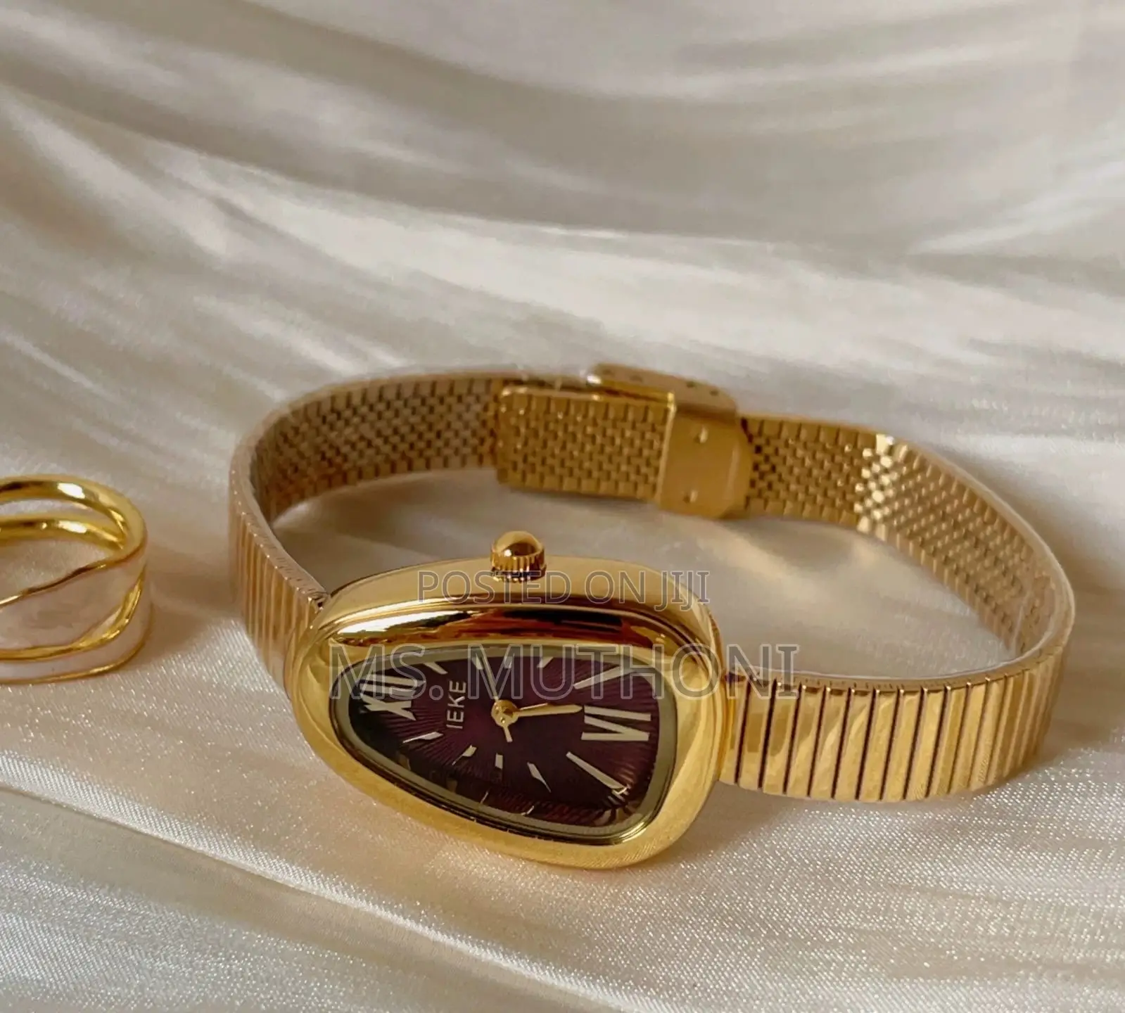 Ieke Brand Gold-Colored Female Wristwatch With a Mesh Strap