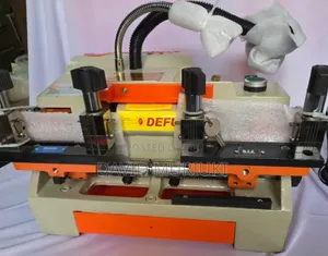 Defu 100e1 Double-Head Key Cutting Machine.