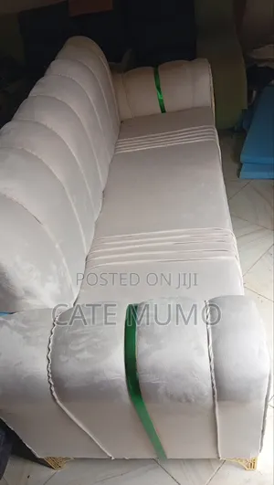 A Cream 3 Seater Sofa
