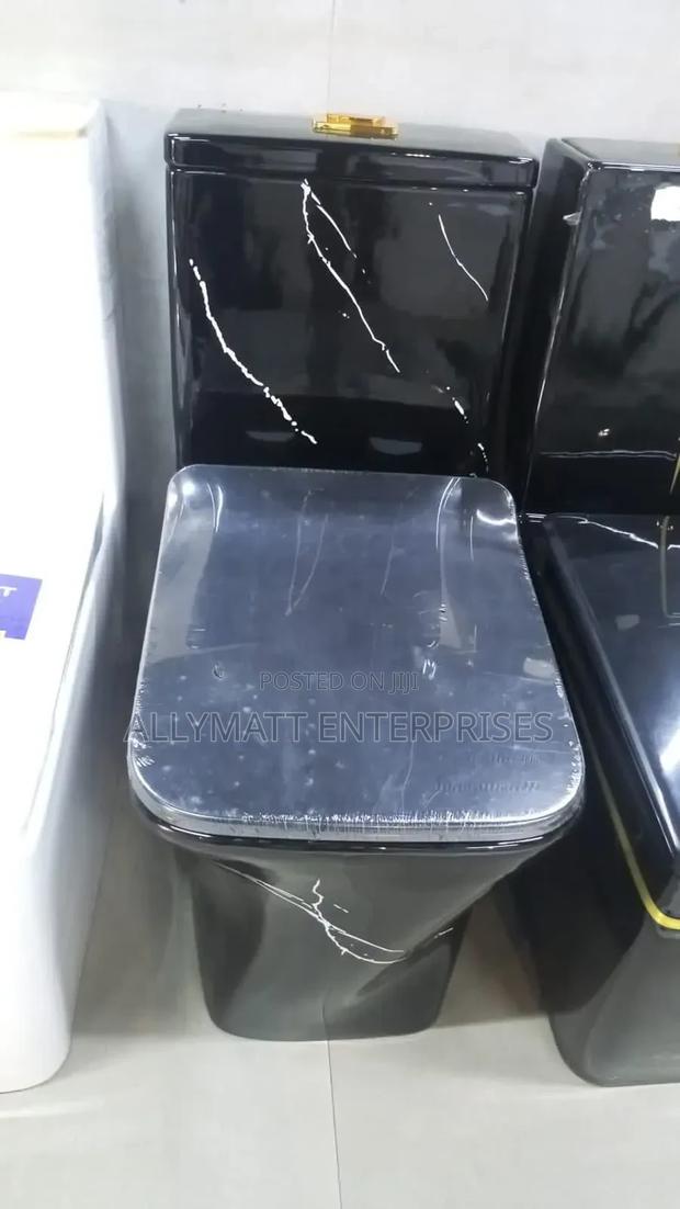 Black White Stripped Toilet One Piece - main view