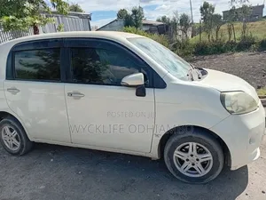 Toyota Porte 2015 Pearl