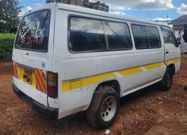 Nissan Caravan (Urvan) 2009 White - thumbnail 2