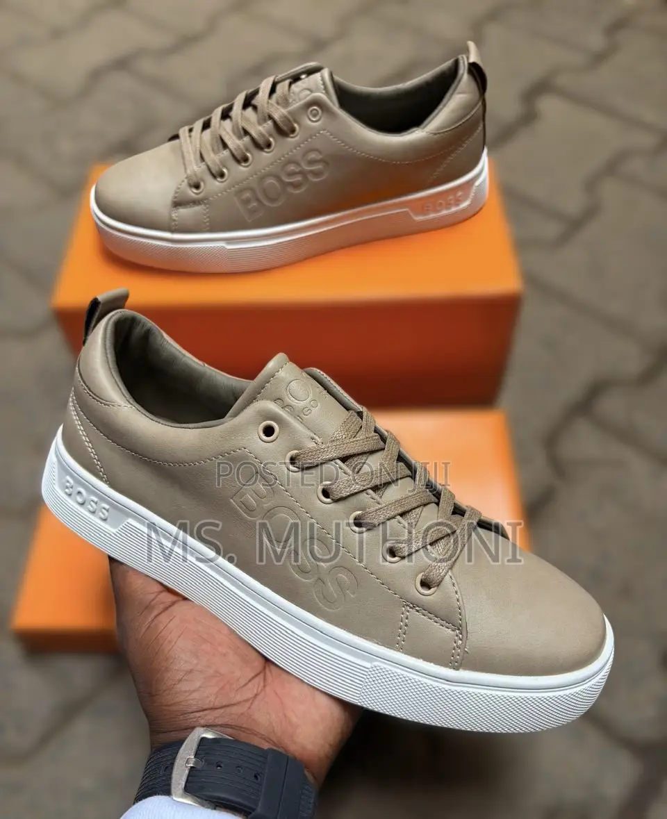 Hugo Boss Men's Leather Sneakers Featuring a Thick White Rubber Sole.
