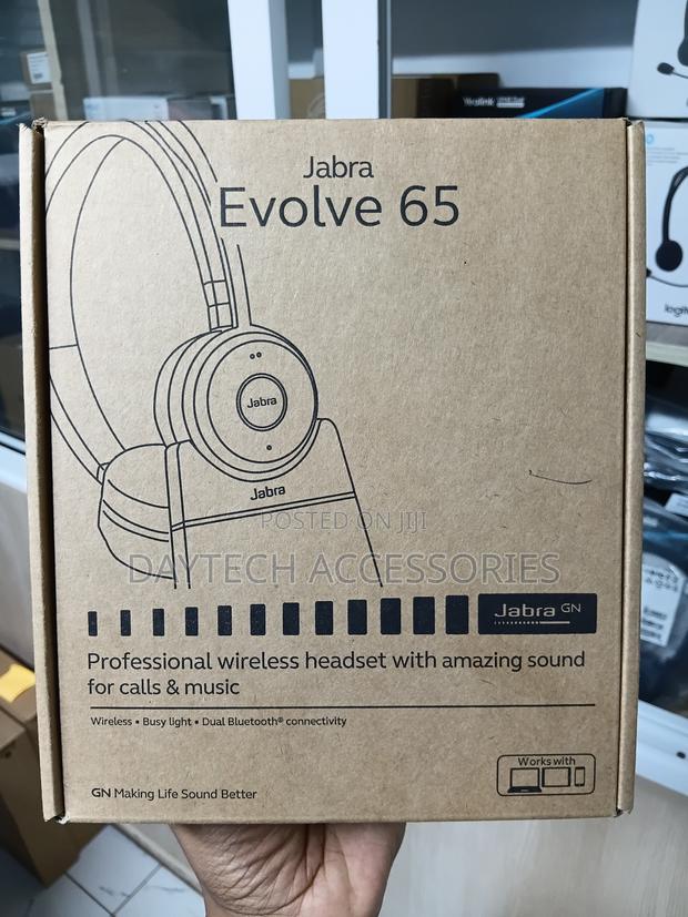 This Is a Jabra Evolve 65 Se Bluetooth Headset With a Charging Stand. - thumbnail 3