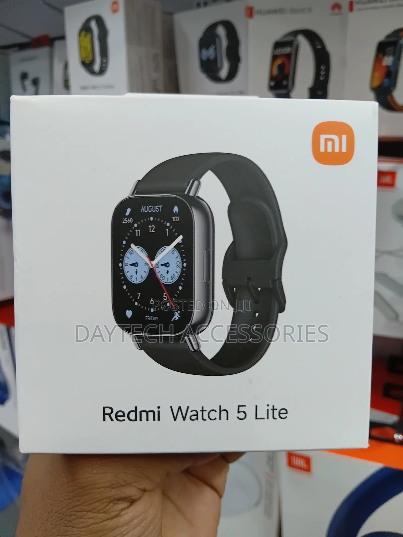 This Is a Xiaomi Redmi Watch 5 Lite Smart Watch With a Black Band.