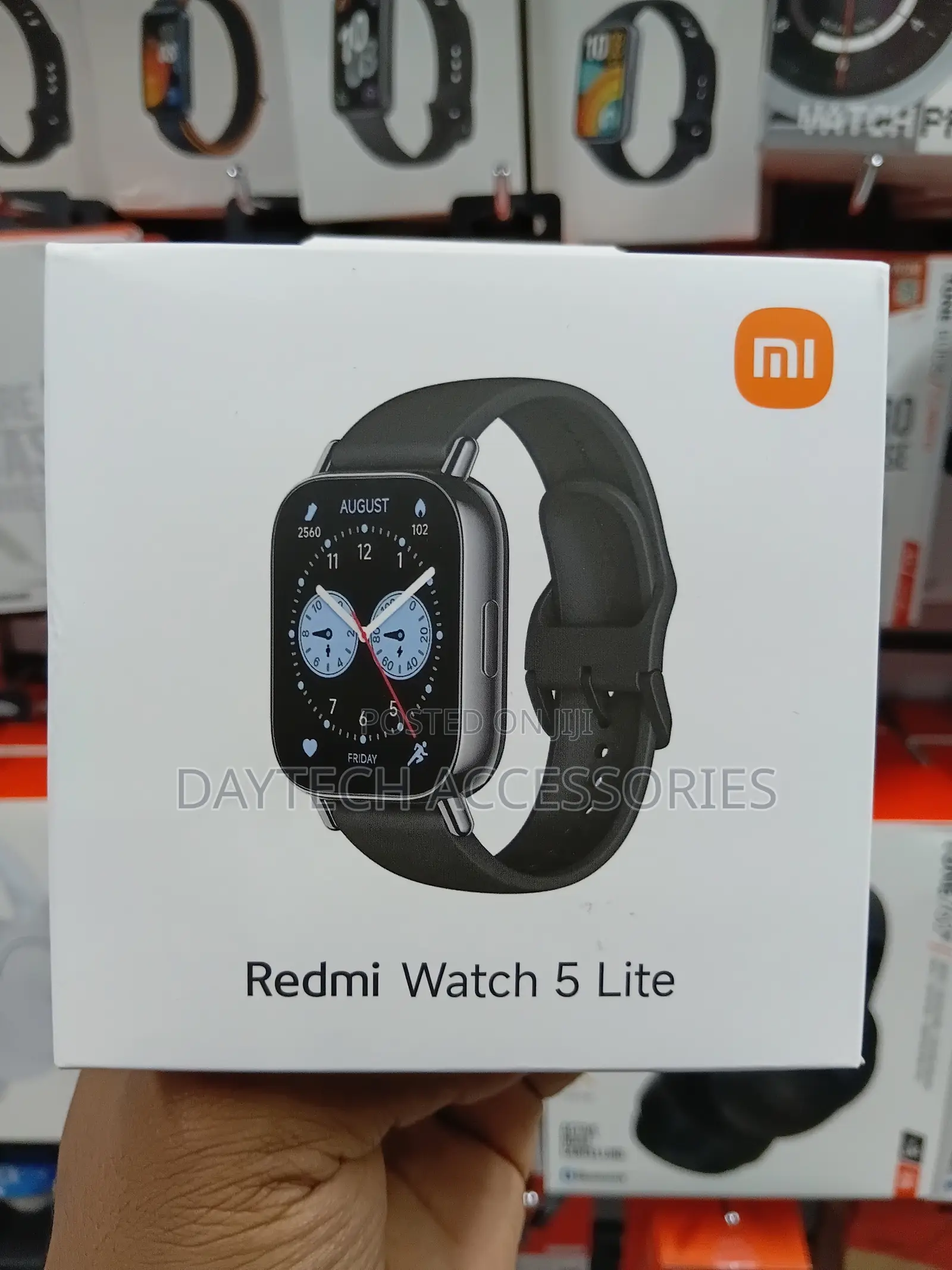 This Is a Xiaomi Redmi Watch 5 Lite Smart Watch With a Black Band.