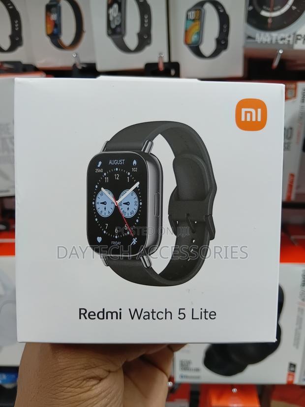 This Is a Xiaomi Redmi Watch 5 Lite Smart Watch With a Black Band. - thumbnail 4