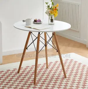 Home Tables; Round Imported Eames Dining Tables
