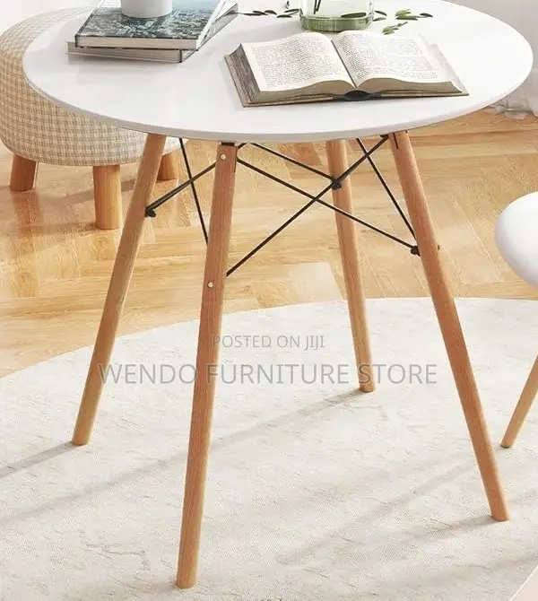 Home Tables; Round Imported Eames Dining Tables