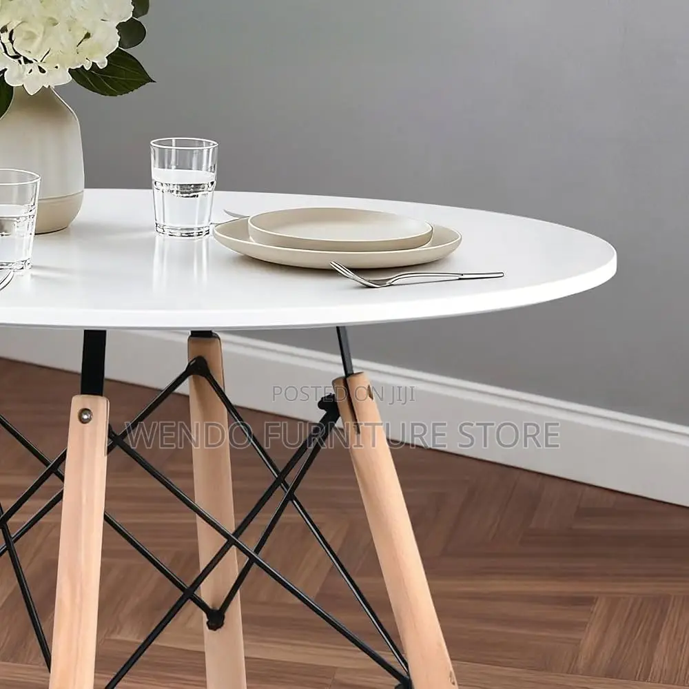Home Tables; Round Imported Eames Dining Tables
