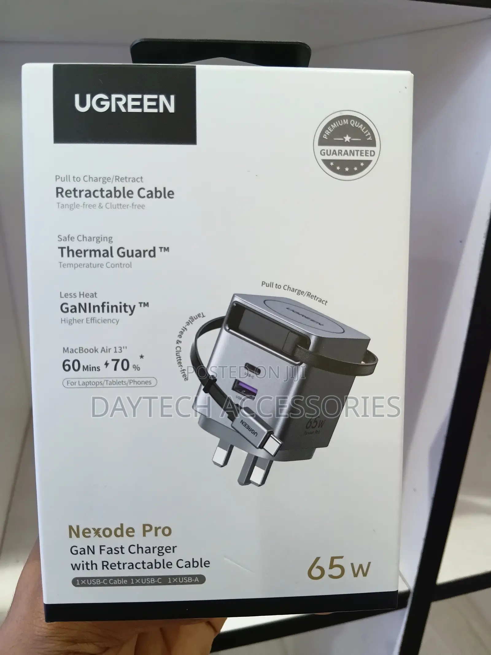 Ugreen Nexode Pro 65w Gan Fast Charger With a Retractable Usb-C Cable.