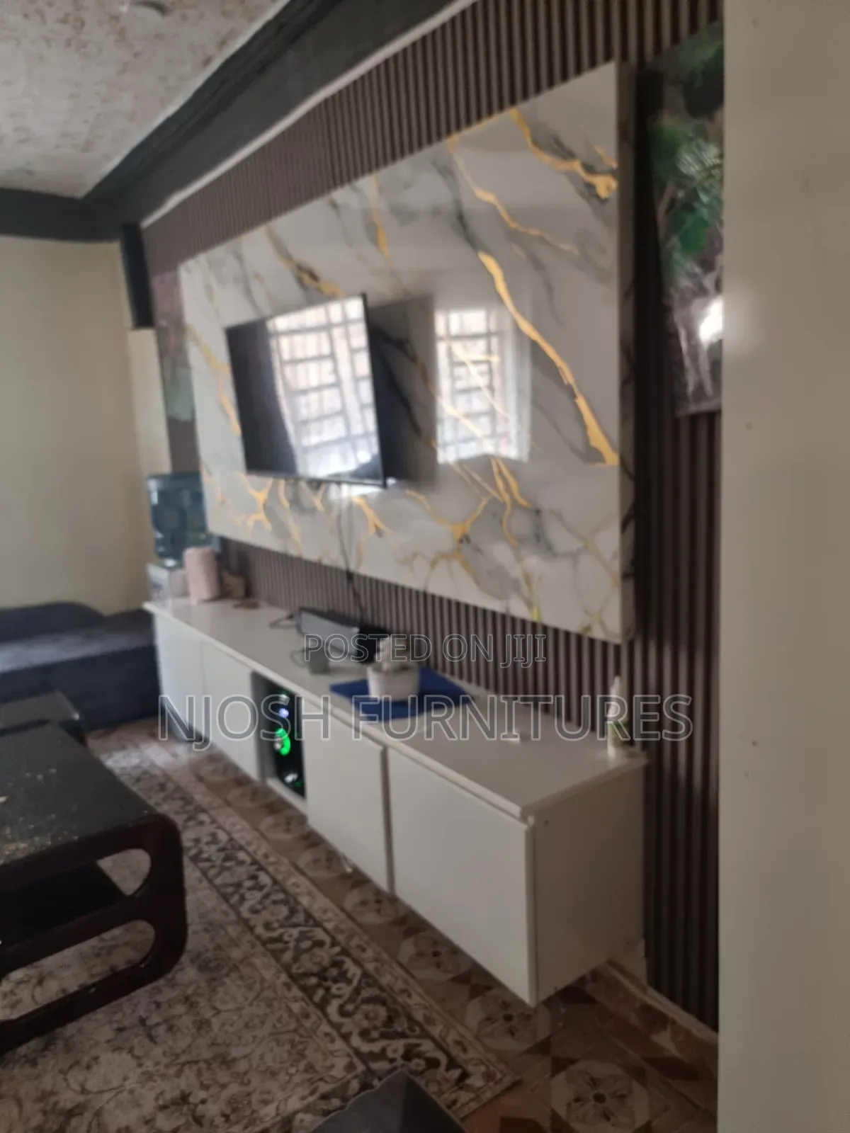Wall Unit Designed With Marble and Panels