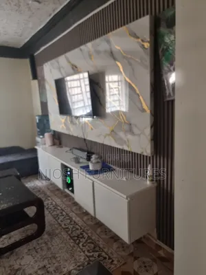 Wall Unit Designed With Marble and Panels