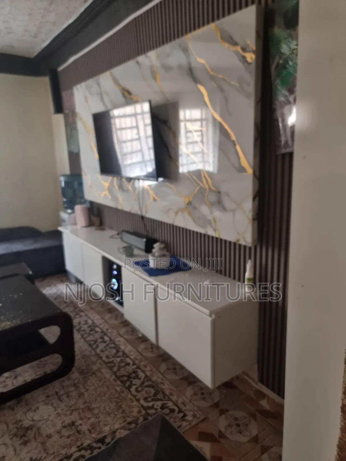 Wall Unit Designed With Marble and Panels