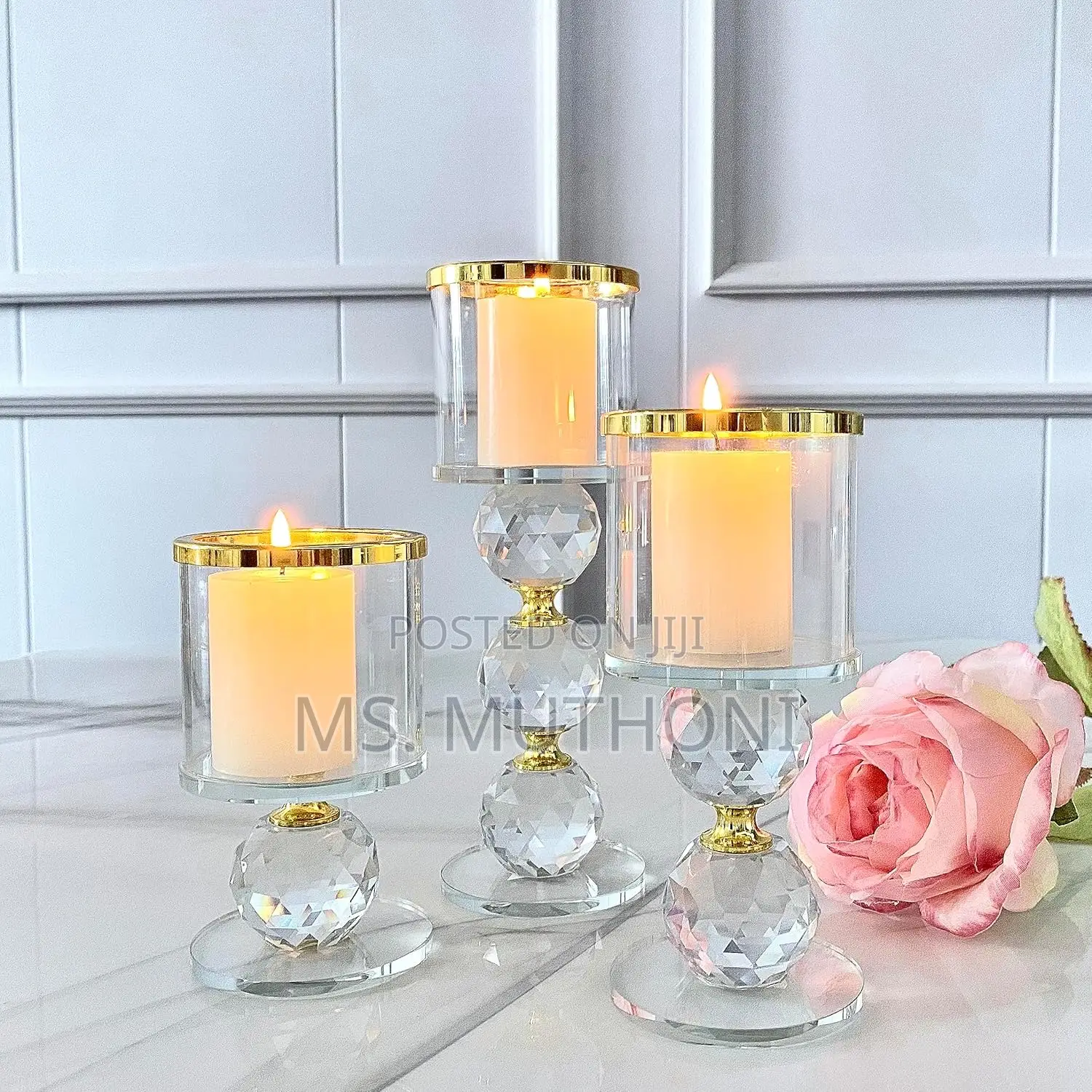 Crystal Pillar Candle Holder Set of Three With Gold-Rimmed Glass Tops.