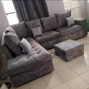 Light Gray L-Shaped 6 Seater + Puff
