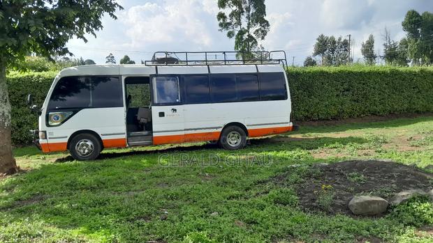 Toyota Coaster 2007 White - thumbnail 3