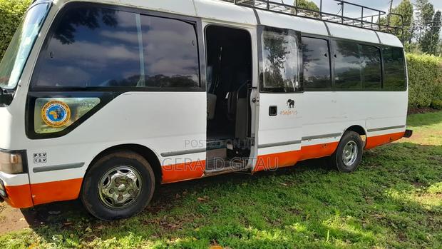 Toyota Coaster 2007 White - thumbnail 4