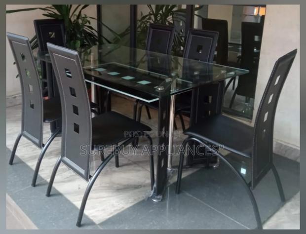 Executive 6 Sitter Glass Dinning Table With Leather Seat - main view
