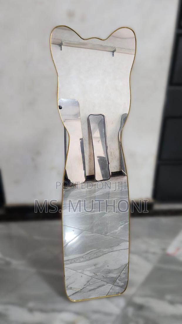 Unbreakable Whimsical Bear-Shaped Top and a Thin Gold Frame Mirror - main view