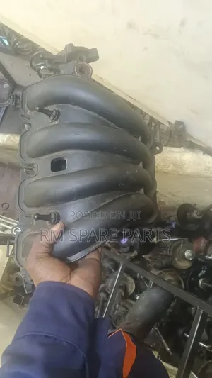 Manifold Mazda Demio