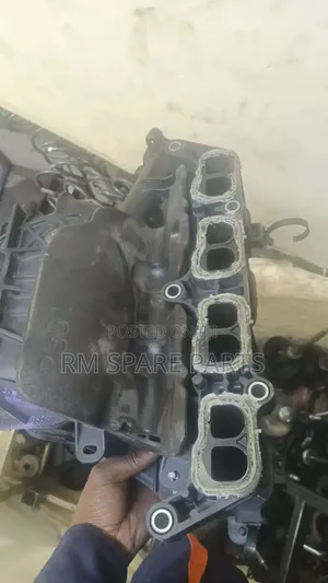 Manifold Mazda Demio