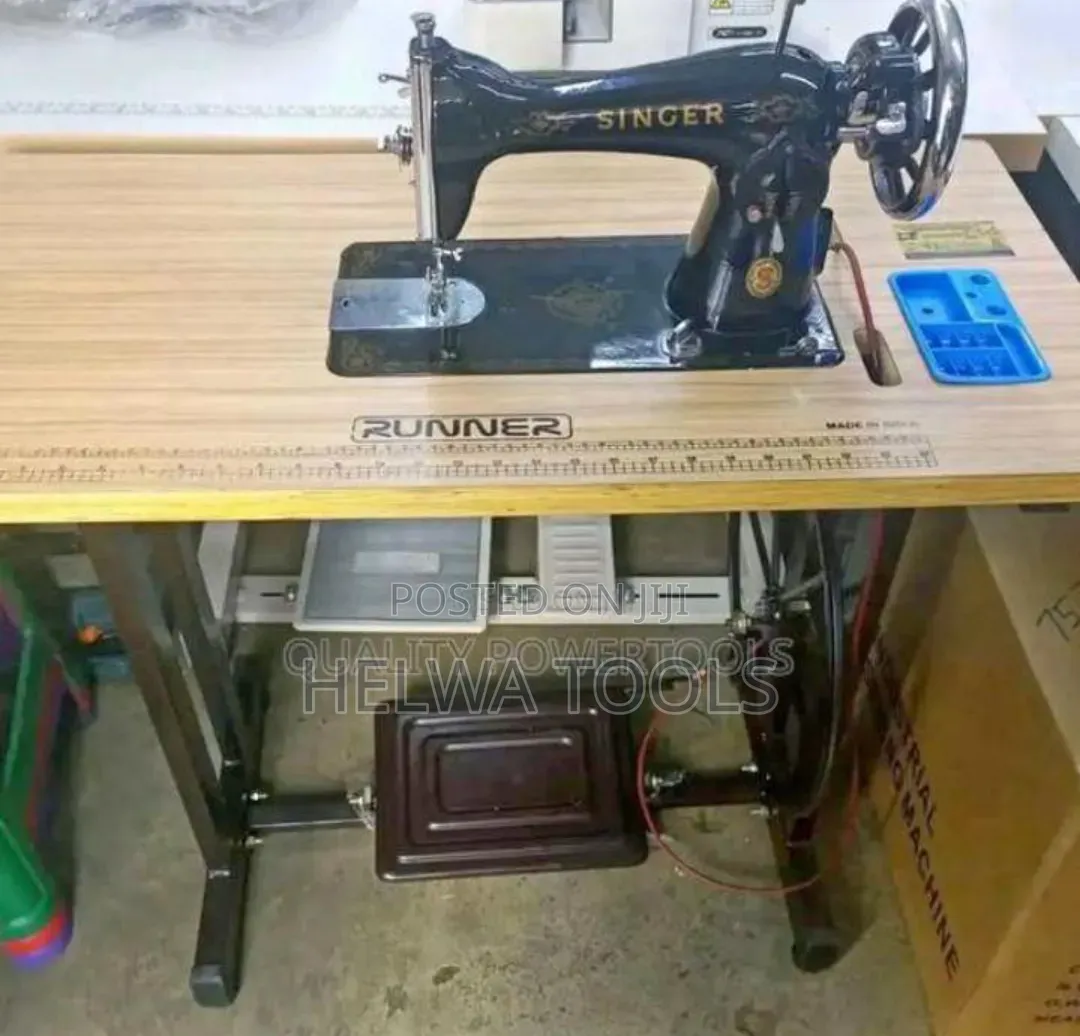 Singer Sewing Machine With Electric Motor