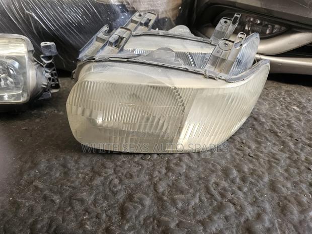 Ford Escape 2003 Headlight