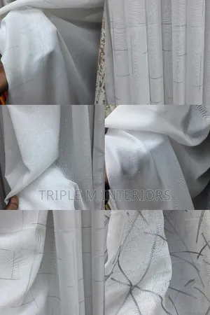Elevate Your Curtains With Crisp White Sheers.