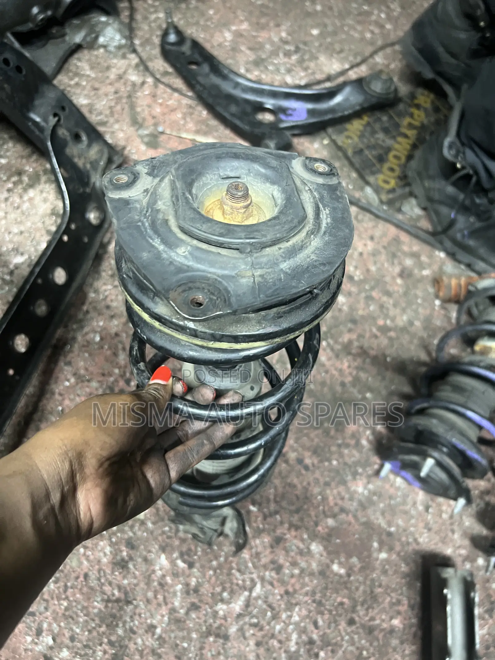 Nissan Tiida Front Shock