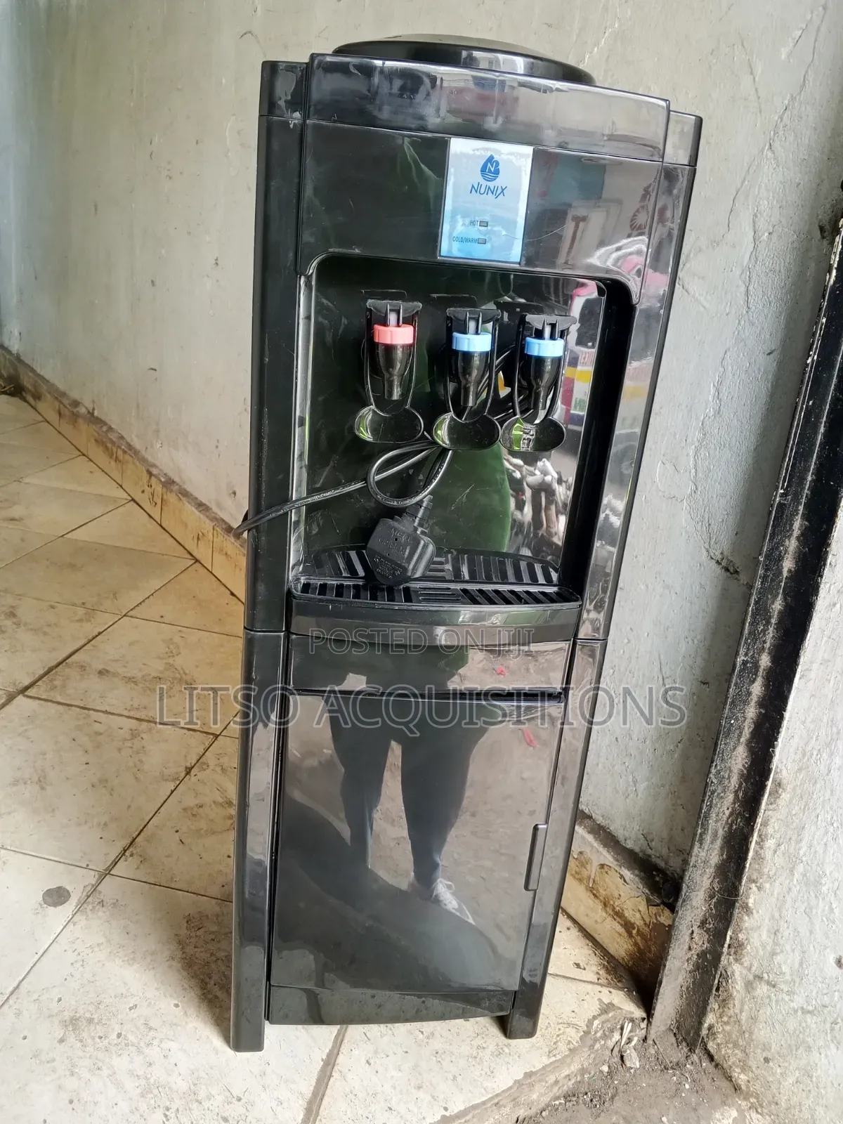 Nunix Brand Freestanding Water Dispenser. Hot, Cold and Warm.