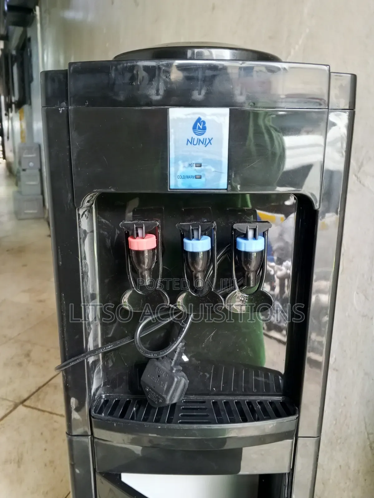 Nunix Brand Freestanding Water Dispenser. Hot, Cold and Warm.