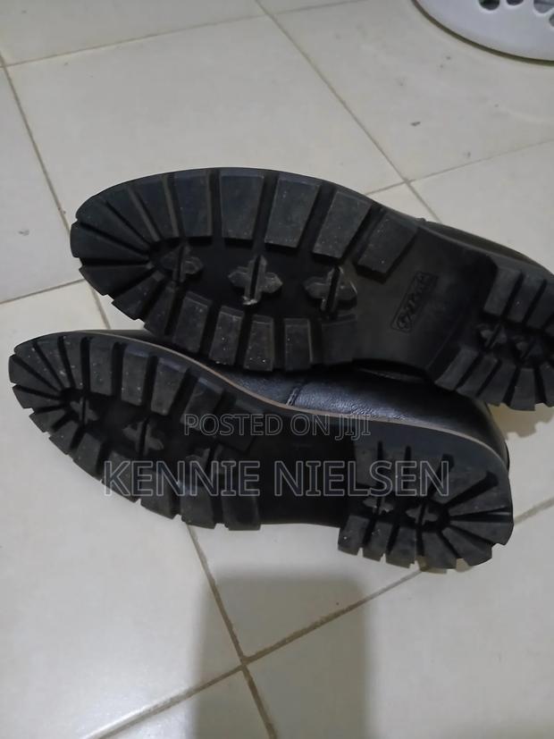 These Black Chelsea Boots Feature a Lug Sole for Added Traction. - thumbnail 5