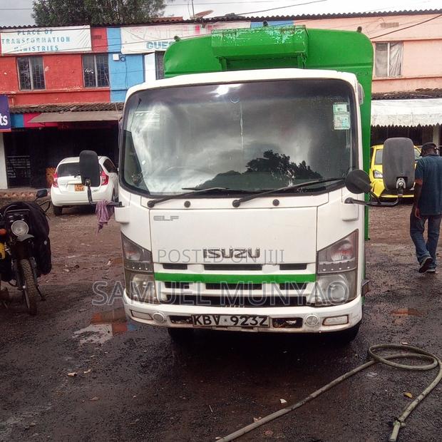Isuzu Elf 2006 White - thumbnail 3