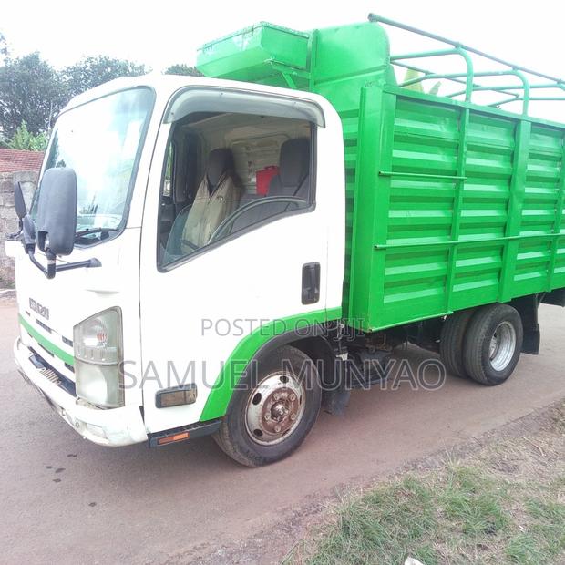 Isuzu Elf 2006 White - thumbnail 4
