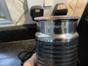 Nespresso-Delonghi. With Creamer Machine.