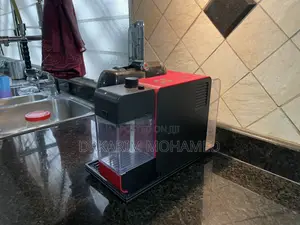 Nespresso-Delonghi. With Creamer Machine.