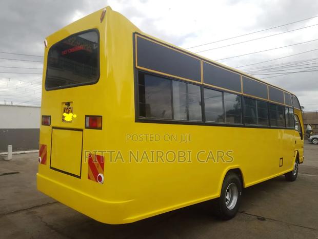 Isuzu NQR 2015 Yellow - thumbnail 2